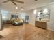The main bedroom showcasing its generous size, hardwood floors and natural light at 4307 Camino Real, Sarasota, FL 34231