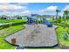 Vibrant playground with swings, slides, and climbing structures, offering children a fun and active play area at 4505 Dusky Dawn Ln, Palmetto, FL 34221
