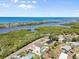 Panoramic aerial shot showcasing a home's prime location near the beach and stunning coastal landscapes at 4717 Lemon Bay Dr, Venice, FL 34293