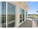 Balcony with view and sliding glass doors at 4717 Lemon Bay Dr, Venice, FL 34293