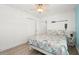 Inviting bedroom featuring coastal decor and ample natural light at 4717 Lemon Bay Dr, Venice, FL 34293