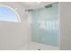 Modern shower boasts dual shower heads and tiled surround at 4717 Lemon Bay Dr, Venice, FL 34293