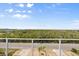 Scenic view from balcony overlooking road and landscape at 4717 Lemon Bay Dr, Venice, FL 34293