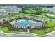 Aerial view of the community center featuring a large pool, playground, and well-maintained grounds at 5030 Rocky Coast Pl, Palmetto, FL 34221