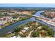 Aerial view of the property, canal, and surrounding cityscape at 5377 Palos Verdes Dr, Sarasota, FL 34231