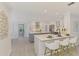Open kitchen concept featuring modern appliances, an island with seating, and elegant finishes at 5377 Palos Verdes Dr, Sarasota, FL 34231