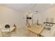 Bright office featuring stylish decor, modern ceiling fan, and light wood-look flooring at 5377 Palos Verdes Dr, Sarasota, FL 34231
