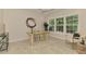 Bright office with a stylish desk, ample natural light, and chic decor for productive work at 5377 Palos Verdes Dr, Sarasota, FL 34231