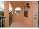 Charming balcony with decorative iron railing, offering a private outdoor space at 5388 Davini St, Sarasota, FL 34238