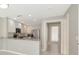 Modern kitchen with stainless steel appliances, granite countertops, and ample white cabinetry at 5388 Davini St, Sarasota, FL 34238