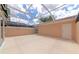 Spacious screened-in patio with neutral floor, offering privacy and shade for outdoor enjoyment at 5388 Davini St, Sarasota, FL 34238