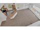 Open living room featuring neutral carpet, a ceiling fan, and lots of bright natural light at 5531 Rosehill Rd # 204, Sarasota, FL 34233