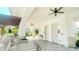 Community outdoor seating area offers a relaxing space with ample seating and covered shade at 5684 Blue Reef Place, Nokomis, FL 34275