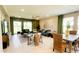 Spacious living and dining area with ample seating, bright light, and a relaxing atmosphere at 5684 Blue Reef Place, Nokomis, FL 34275