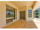 The patio features sliding glass doors and great views of the backyard at 585 Khyber Ln, Venice, FL 34293