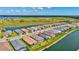 Aerial view of the home's location within the community with water views and nearby walking trails at 6203 Grandview Hill Ct, Bradenton, FL 34203