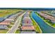 Aerial view of the homes in the community with a lake view providing great views at 6203 Grandview Hill Ct, Bradenton, FL 34203