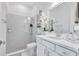 Elegant bathroom features a glass-enclosed shower, modern vanity, and neutral color palette at 6203 Grandview Hill Ct, Bradenton, FL 34203