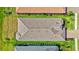 Aerial view of a well maintained tile roof and lush landscaping of this beautiful single-Gathering home at 6203 Grandview Hill Ct, Bradenton, FL 34203