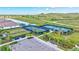 Community tennis and pickleball courts with lush landscaping and amenities, perfect for active residents at 6203 Grandview Hill Ct, Bradenton, FL 34203