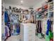 Spacious walk-in closet with custom shelving, ample storage, and organization solutions at 6203 Grandview Hill Ct, Bradenton, FL 34203