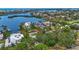 Single-Gathering home featuring a pool, mature trees, landscaping, and proximity to the bay at 6343 Hollywood Blvd, Sarasota, FL 34231