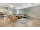 Open-concept living room featuring comfortable seating, stylish decor, and ample natural light at 6343 Hollywood Blvd, Sarasota, FL 34231