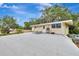 Spacious roof deck with lounge chairs and a grill, perfect for outdoor entertaining and relaxation at 6343 Hollywood Blvd, Sarasota, FL 34231