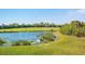 Scenic golf course and lake view on a clear day at 6509 Grand Estuary Trl # 203, Bradenton, FL 34212