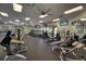 Spacious gym featuring a variety of fitness equipment and mounted TVs at 6509 Grand Estuary Trl # 203, Bradenton, FL 34212