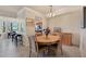 A view of the dining and kitchen areas showing an open floor plan at 6509 Grand Estuary Trl # 203, Bradenton, FL 34212