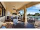 Inviting covered patio with comfortable seating overlooking the sparkling pool at 6509 Grand Estuary Trl # 203, Bradenton, FL 34212
