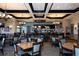 The restaurant features a full bar, tables, and chairs, perfect for casual dining and social gatherings at 6509 Grand Estuary Trl # 203, Bradenton, FL 34212