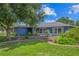 Charming single-story home featuring a beautifully landscaped yard and a freshly painted exterior at 6605 253Rd St E, Myakka City, FL 34251