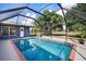 Lovely screened-in pool and patio area with views of the large backyard at 6605 253Rd St E, Myakka City, FL 34251