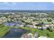 An aerial view of a scenic golf course community with ponds and well-manicured landscaping at 6702 Drewrys Blf, Bradenton, FL 34203