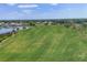 Lush green golf course provides a serene backdrop for relaxation and recreation at 6702 Drewrys Blf, Bradenton, FL 34203