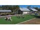 A charming community area features a playground, picnic pavilion, and lovely landscaping at 6702 Drewrys Blf, Bradenton, FL 34203