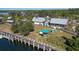 An aerial shot of community docks, grilling spaces, and covered seating areas at 6702 Drewrys Blf, Bradenton, FL 34203
