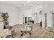 Open concept living space with light wood floors and lots of natural light at 6702 Drewrys Blf, Bradenton, FL 34203