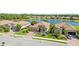 Beautiful aerial view of a lakeside home in a well-maintained community at 7120 Quiet Creek Dr, Bradenton, FL 34212