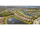 Stunning aerial view of a community with beautiful lakes and well-maintained landscaping at 7120 Quiet Creek Dr, Bradenton, FL 34212