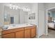 Bright bathroom with double sinks, spacious countertops, and a seamless glass shower, offering convenience and style at 7120 Quiet Creek Dr, Bradenton, FL 34212