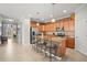 Well-equipped kitchen with stainless steel appliances, granite countertops, breakfast bar, and ample cabinet space at 7120 Quiet Creek Dr, Bradenton, FL 34212