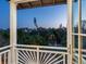An outdoor balcony provides the ideal place to relax while overlooking lush greenery at 7333 Point Of Rocks Rd, Sarasota, FL 34242