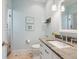 Bathroom with granite countertop, white cabinets and glass shower at 7333 Point Of Rocks Rd, Sarasota, FL 34242