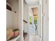 Entryway with wainscoting and view to the pool area at 7333 Point Of Rocks Rd, Sarasota, FL 34242