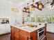 Bright kitchen with a center island, stainless steel appliances, and custom cabinets at 7333 Point Of Rocks Rd, Sarasota, FL 34242