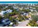 Aerial view of neighborhood showcasing proximity to the beach, and a beautiful, relaxed community at 734 Canal Rd, Sarasota, FL 34242