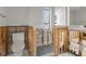 Bathroom with new tiling, offering renovation potential to create a spa-like experience at 734 Canal Rd, Sarasota, FL 34242